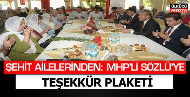 ŞEHİT AİLELERİNDEN: MHP´Lİ SÖZLÜ´YE TEŞEKKÜR PLAKETİ