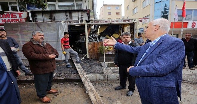 Kül olan iş yerine Fethi Yaşar´dan destek