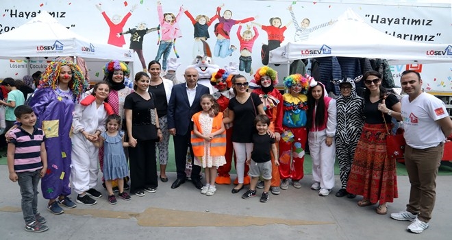 BAŞKAN ALTINOK LÖSEV´İN BAYRAM YARDIMI PROGRAMINA KATILDI